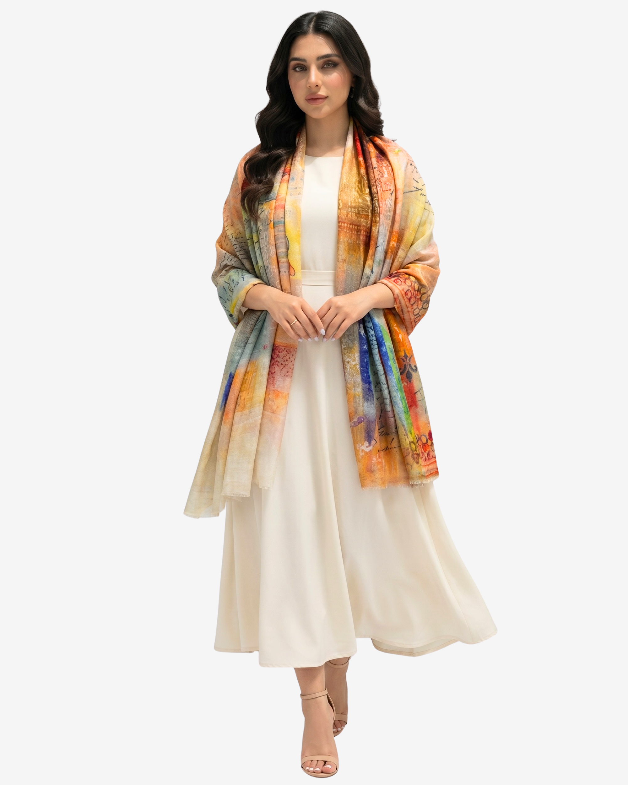 A woman modeling a lightweight, multicolored printed shawl draped over a cream-colored dress against a plain light gray background.