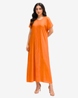 Front view of the Sunset Glow Pleated Maxi Dress showcasing its elegant full-length design and soft pleated front.