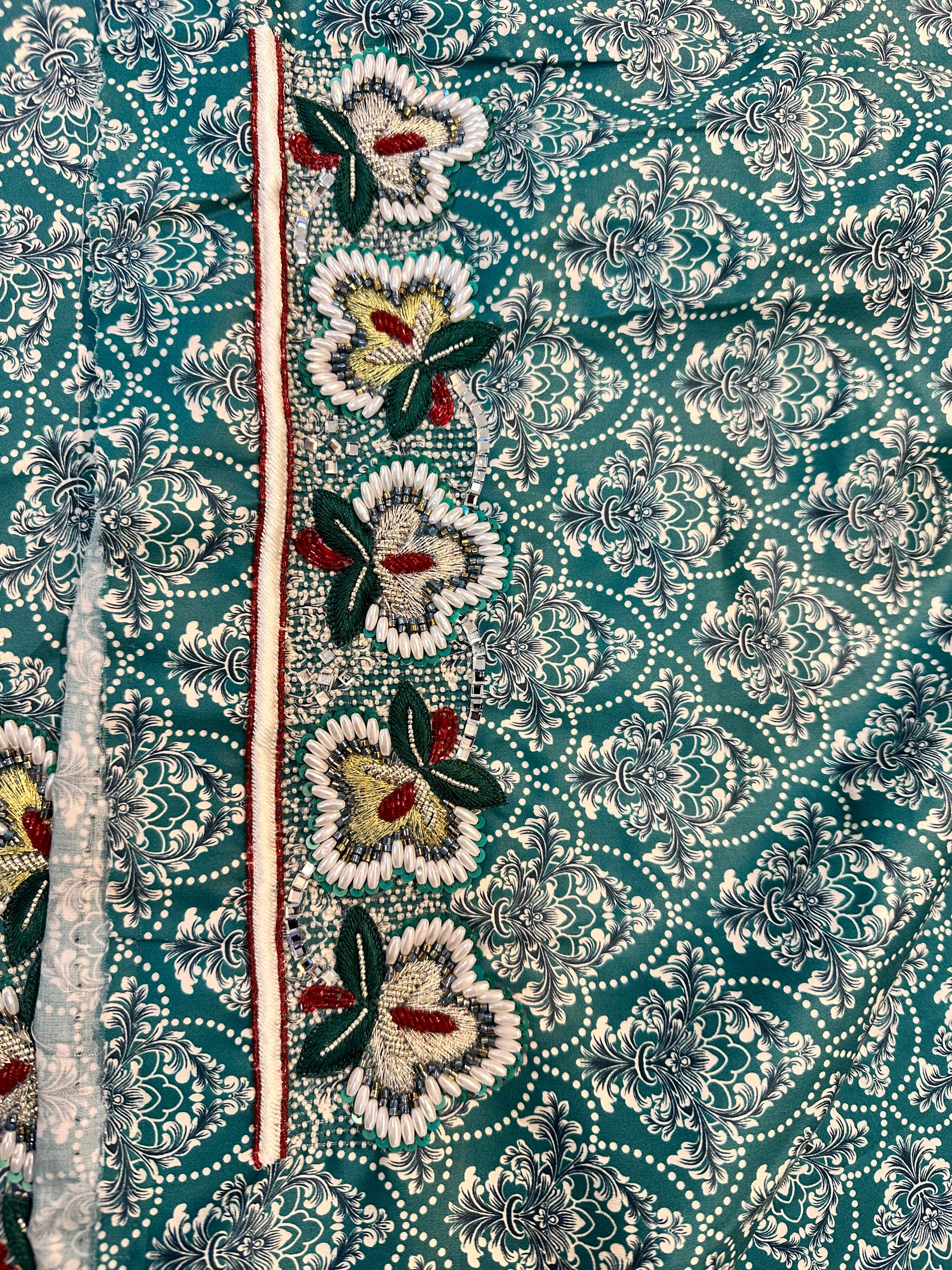 Premium Japan Liberty cotton fabric displaying the teal heritage pattern of the Teal Heritage Liberty Cotton Mukhawar for custom tailoring by Gharza Couture.