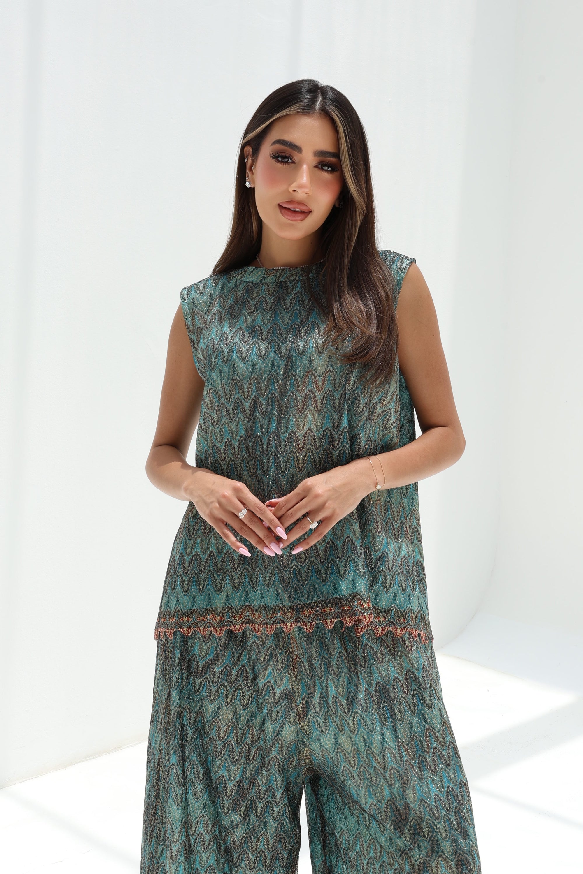 Close-up of Teal Mosaic Lace Three-Piece Set showing the patterned top and waist detail