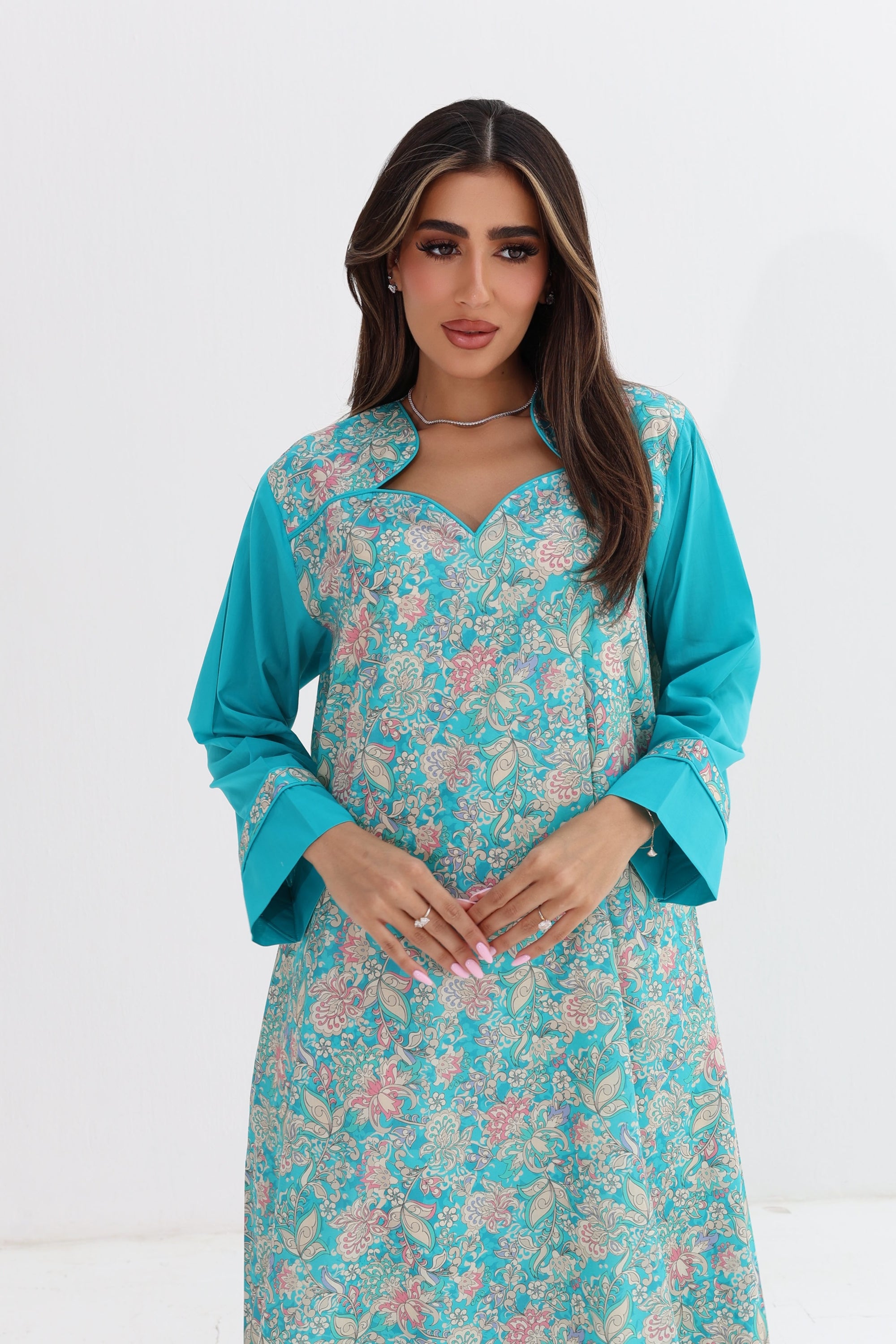 Close-up of Turquoise Floral Paisley Cotton Jalabiya showing neckline and botanical print
