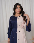 Close-up of the Two-Tone Button Embellished Crepe Kaftan featuring the embellished round neckline and premium crepe fabric.