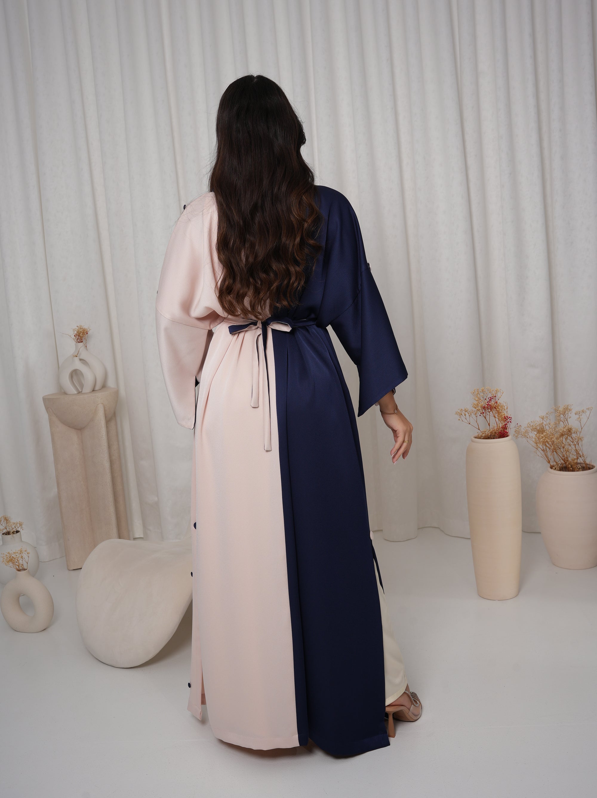 Back view of the Two-Tone Button Embellished Crepe Kaftan showcasing the flowing full-length design in premium crepe.