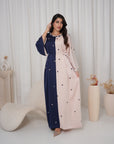 Side view of the Two-Tone Button Embellished Crepe Kaftan highlighting the elegant drape and adjustable waist detail.