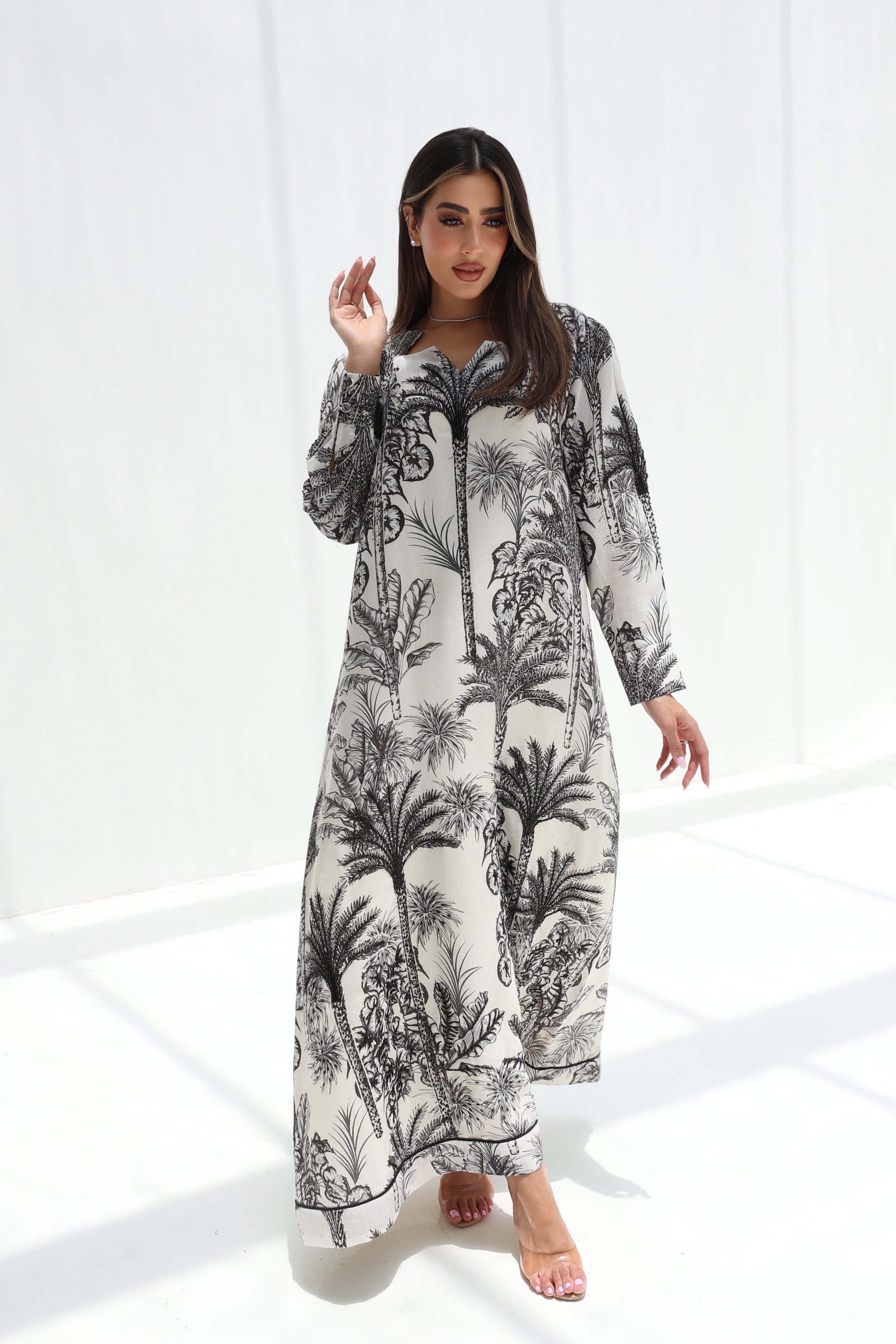 Full-length black Palm Escape Star Neck Jalabiya with tropical palm design