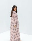 Woman wearing a floral dress on a white background