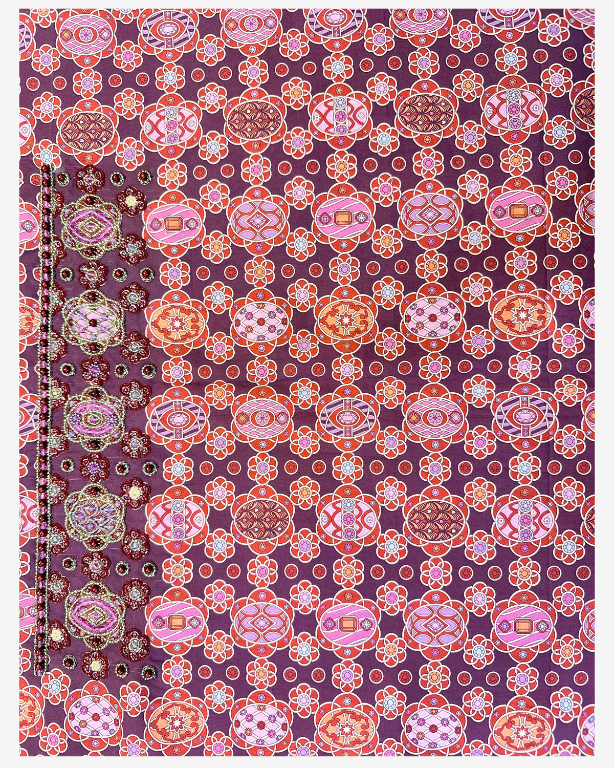 Matching hand design with beaded medallion motifs on burgundy Liberty mukhawar fabric.