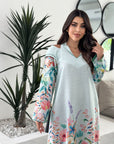 Off-shoulder design detail showcasing the elegant neckline construction.