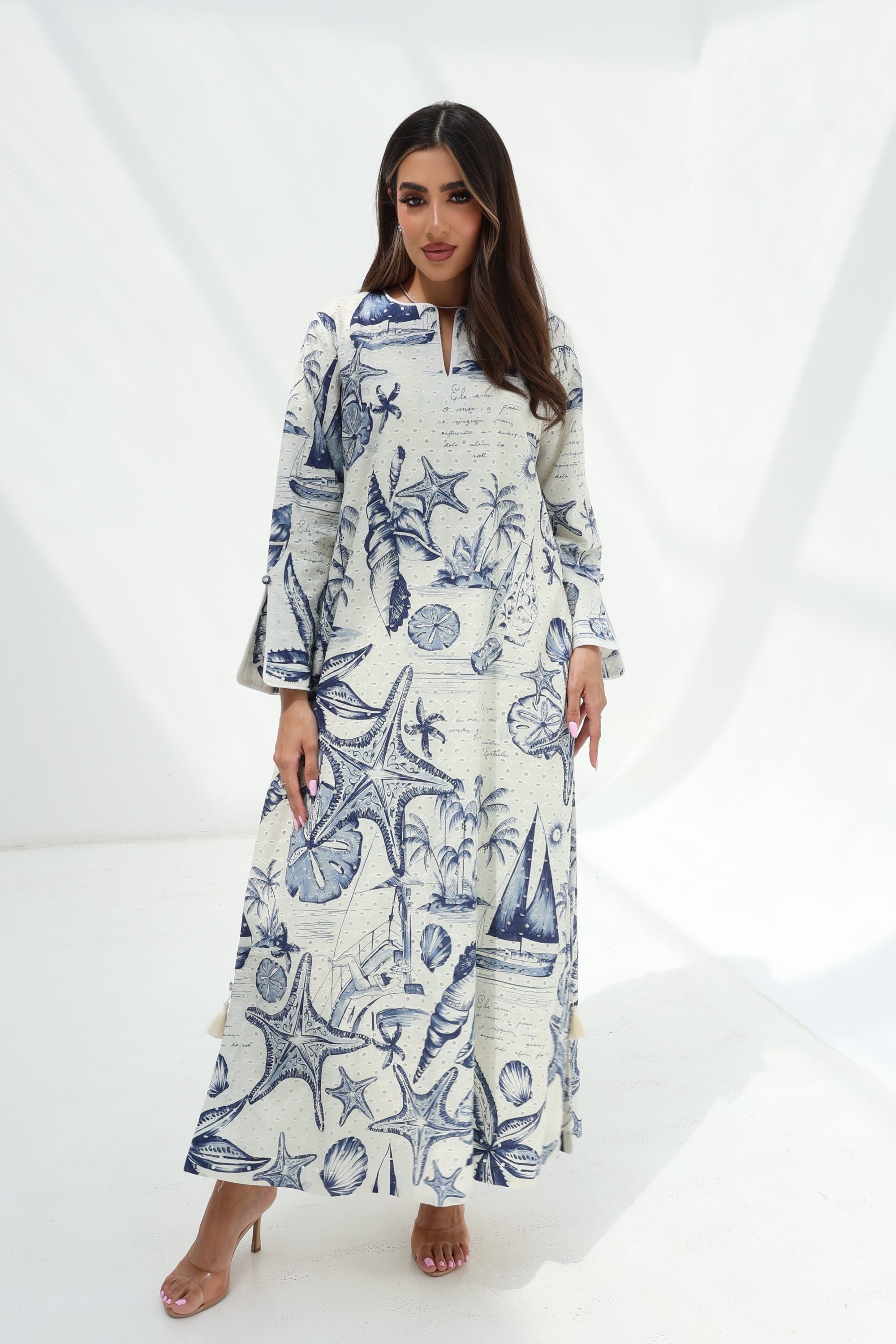 Coastal Seashell Print Cotton Jalabiya front view with eyelet textured cotton fabric