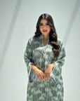 Close-up detail of palm tree print on sage green linen blend jalabiya for women