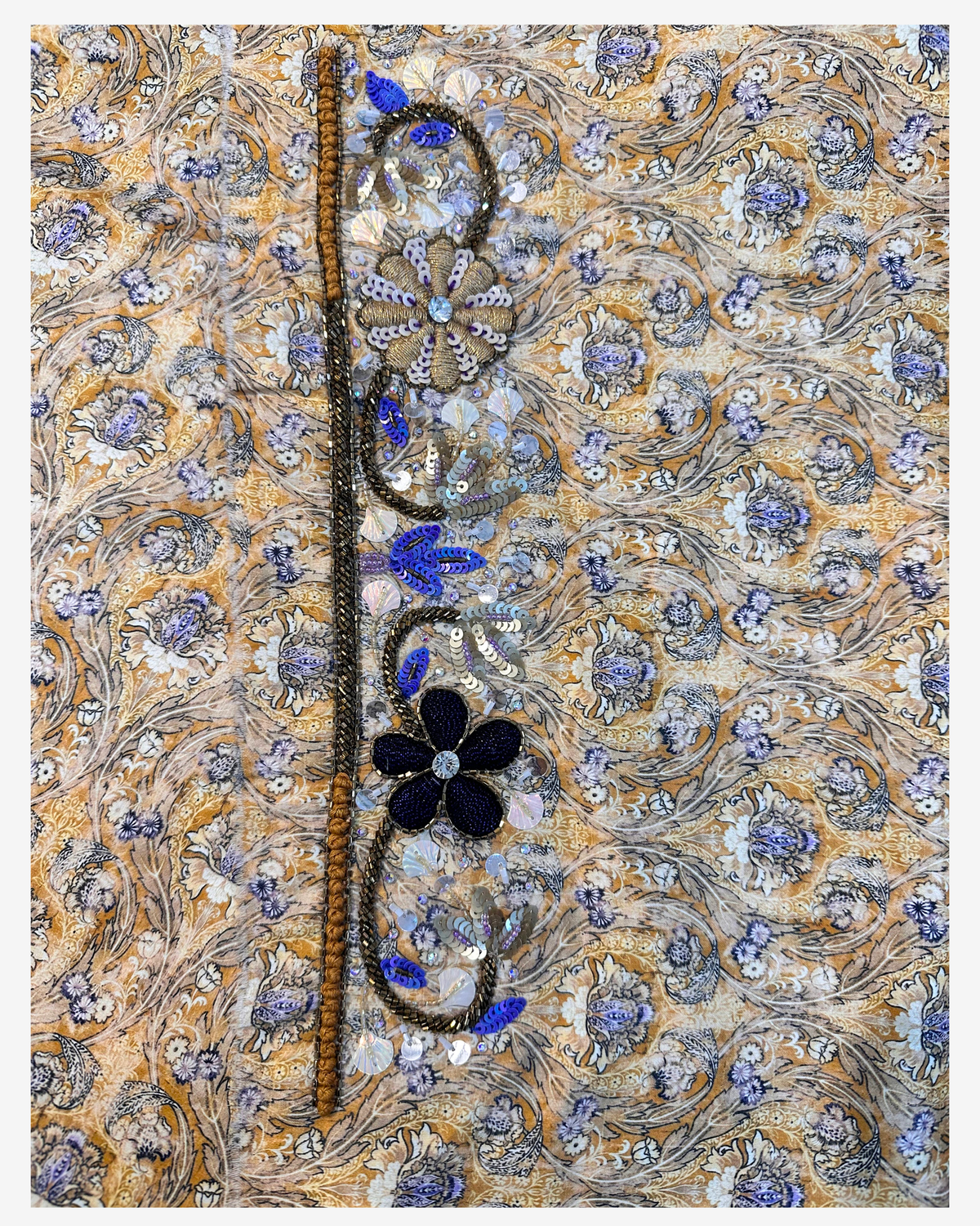 Hand-beaded sleeve detail of the Golden Nocturne Panama digital cotton mukhawar in gold and navy