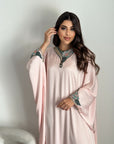 Blush Zahara hand embroidered silk satin kaftan featuring a flowing luxury silhouette and elegant craftsmanship.
