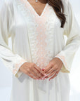 Embroidered and embellished neckline detail on Ivory Pearl Crepe Jalabiya