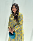 Close-up of yellow floral botanical print on luxury linen blend jalabiya for women