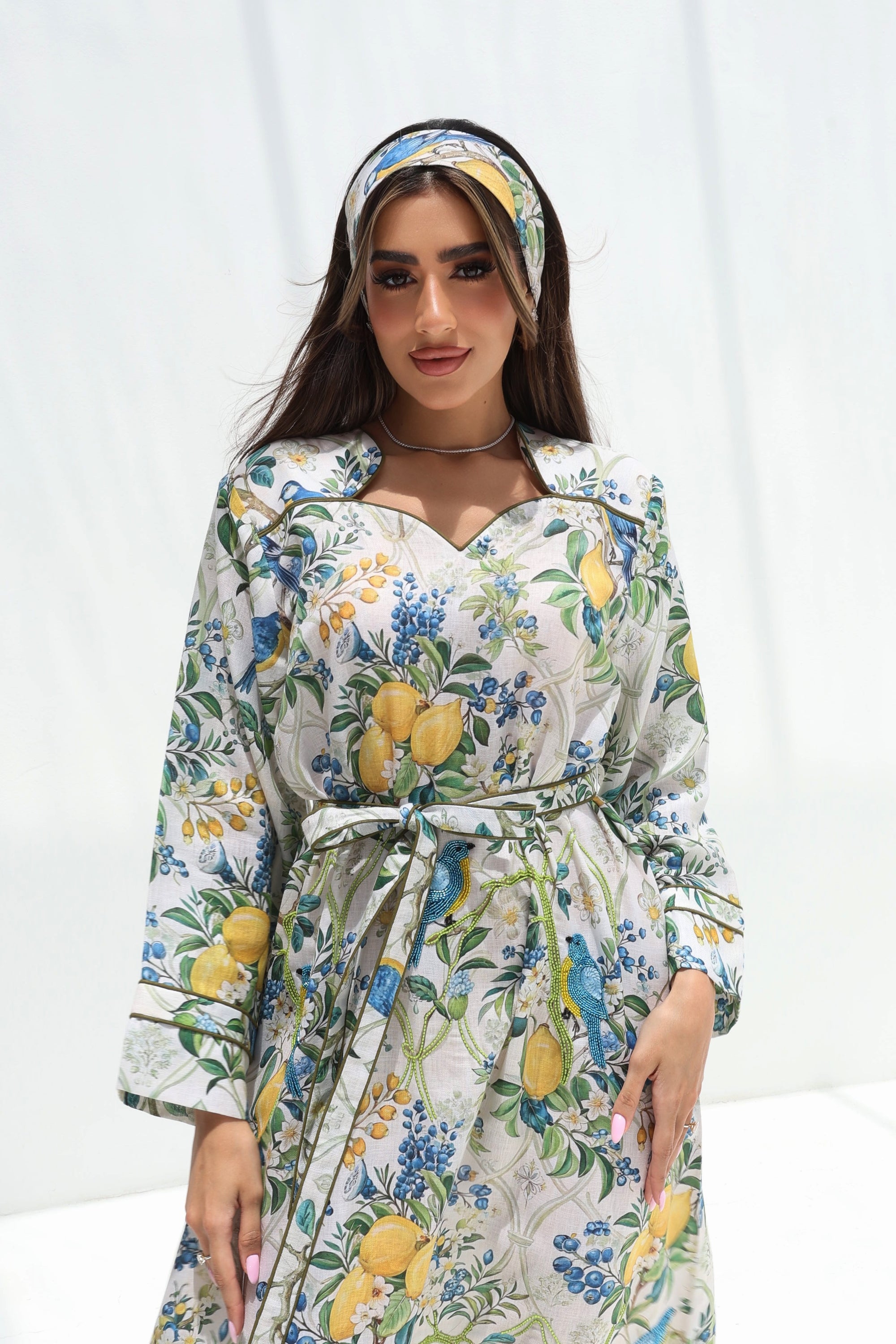 Orchard Aviary Sweetheart Linen Blend Dress showing matching waist sash and botanical print