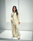 Elegant two-piece travel wear outfit for women with a relaxed and comfortable silhouette.