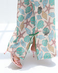 Hand embellishment detail on Seaside Shell Treasures Linen Blend Jalabiya
