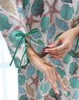 Sleeve tie detail on Seaside Shell Treasures Linen Blend Jalabiya