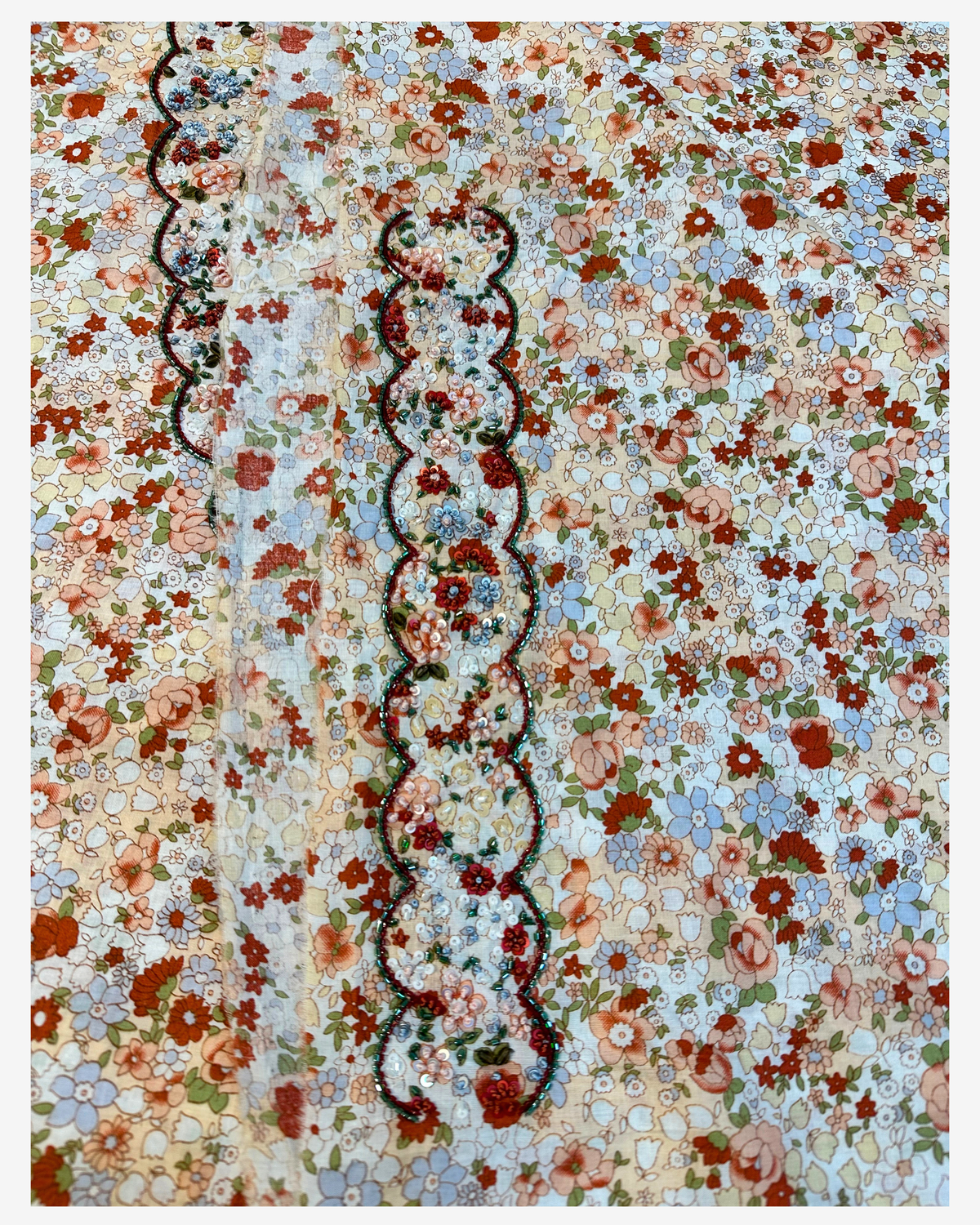 Coordinating hand design with colorful floral beadwork on the Vintage Bloom Italian cotton mukhawar.