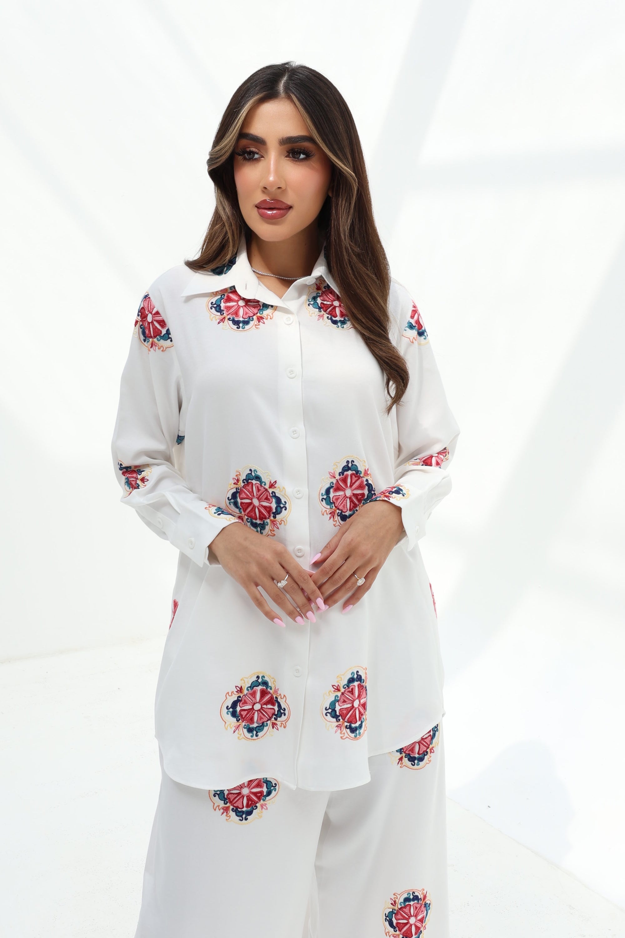 Three-quarter view of the white Floral Medallion Cotton Mix Co-ord Set showcasing the relaxed fit, button-front shirt and wide-leg trousers.