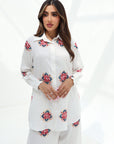 Three-quarter view of the white Floral Medallion Cotton Mix Co-ord Set showcasing the relaxed fit, button-front shirt and wide-leg trousers.