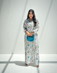 Women's wildflower print linen blend jalabiya with elegant collar neckline and modest full-length silhouette