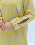 Close-up of Yellow Abstract Linen Blend Jalabiya sleeve featuring slit cuff and decorative button details.
